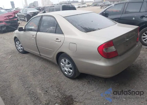 2004 Toyota Camry Le z USA, uszkodzony, nr VIN 4T1BE32K54U324257